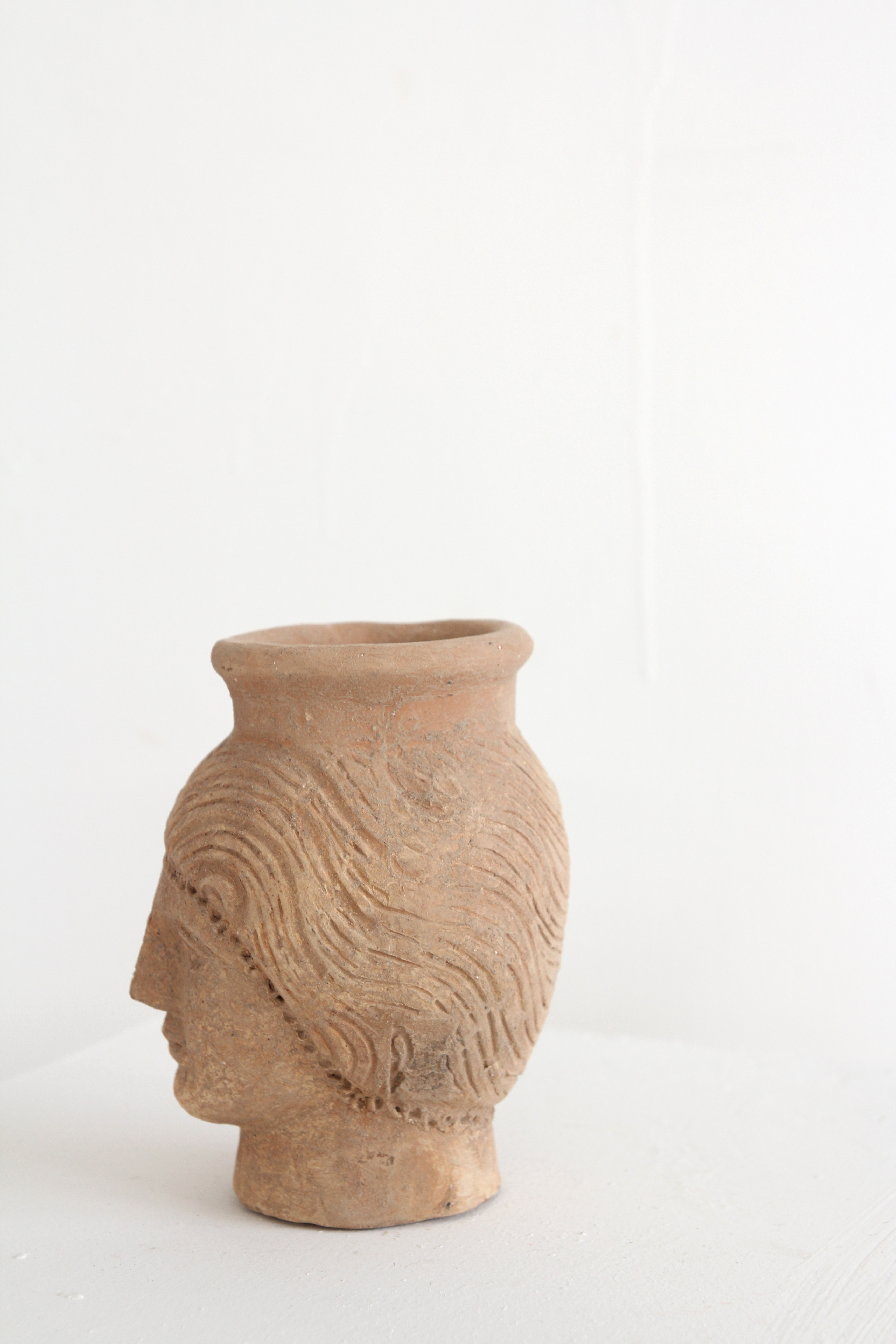 ceramic face vase