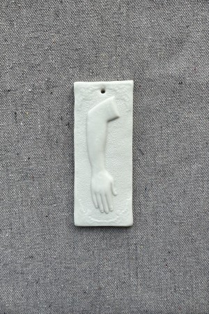 ceramic wall ornament - sq arm