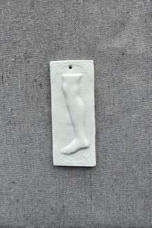 ceramic wall ornament - sq foot