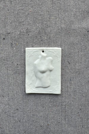 ceramic wall ornament - woman chest